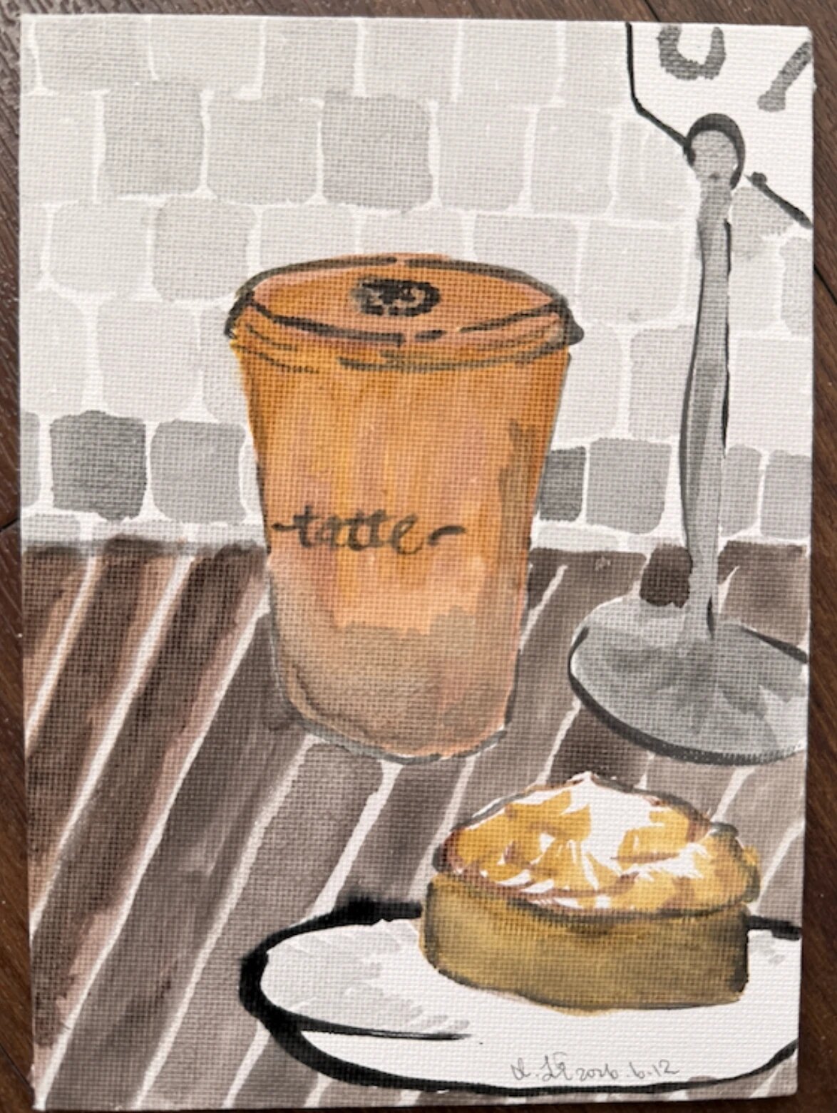 Painting of a latte and a tart.