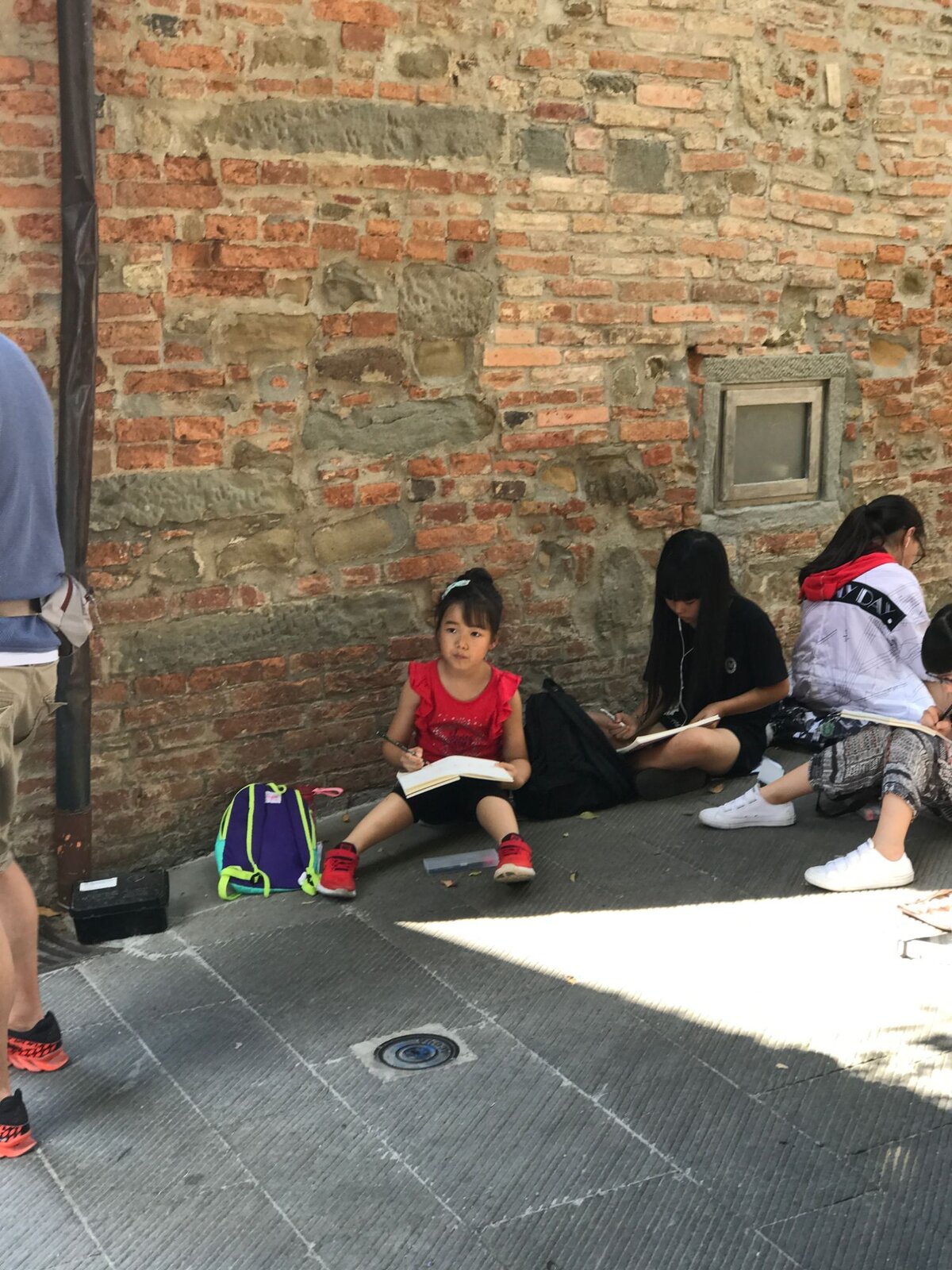 Sketching against a brick wall, 2017.