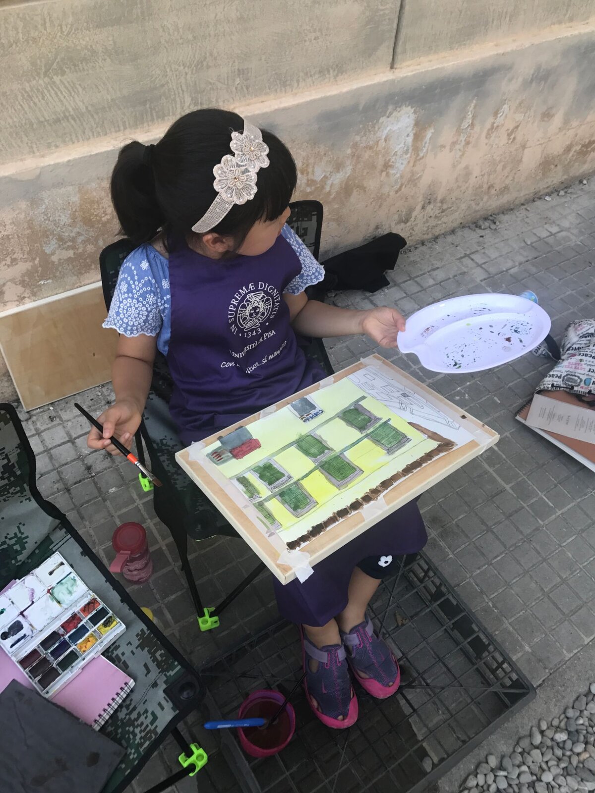 Painting a street scene in watercolor, 2017.
